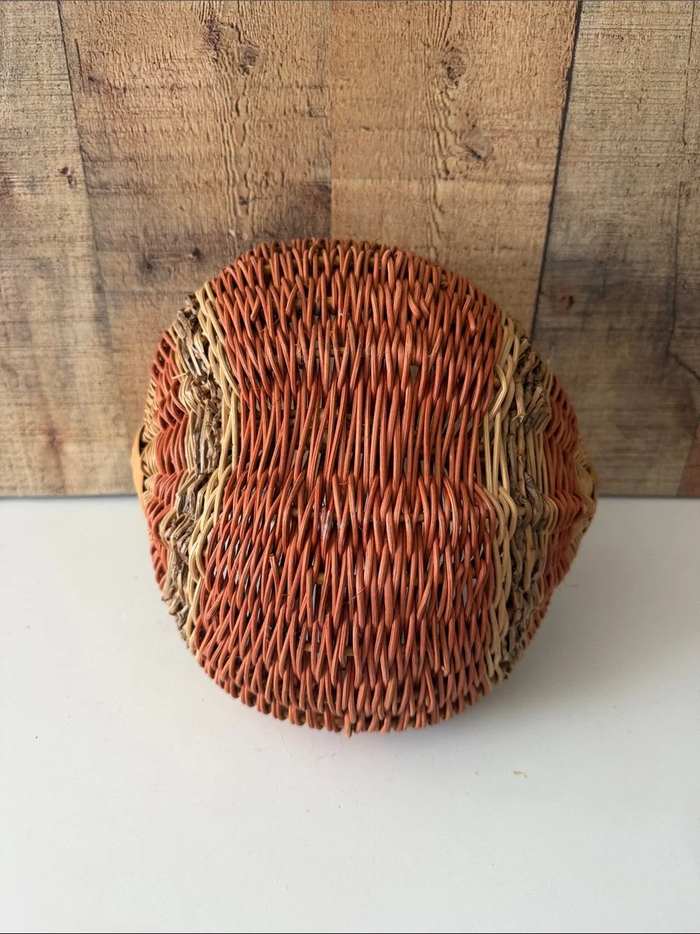 Vintage Primitive Woven Buttocks Basket with God’s Eye in Natural and Terracotta